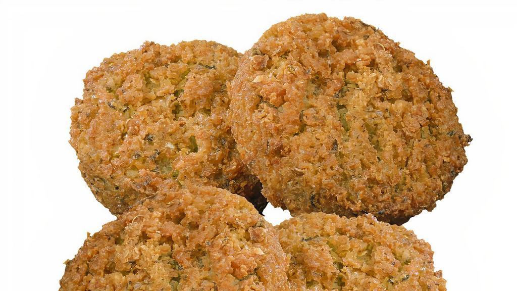 Falafel (4) · 4 pieces of the deep-fried ball made from ground chickpeas and a blend of herbs and spices. Allergen: Contains Soy