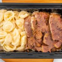 Caitlyn'S Stacked Mac Bowls · Smoked Gouda Mac and Cheese, Add Shredded Ribeye, Pulled Pork, Chicken, or Corned Beef.