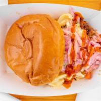 Fat Matt · Chipotle BBQ pulled pork, smoked gouda mac and cheese, and apple slaw piled high on a brioch...