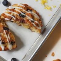 Blueberry Lemon Muffin Top · Lemon-infused batter topped with blueberries, almond crumbles and lemon drizzle.