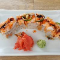 Tiger Roll · Inside: Shrimp tempura and spicy crab. Top: Shrimp and  jalapeño with spicy mayo, eel sauce,...