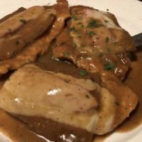 Chicken Eggplant Marsala · Boneless chicken breast layered with eggplant, roasted peppers, melted mozzarella in a sweet...