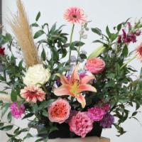 Wild Flower Bouquet  · Comes with different kinds of flowers in a bouquet filled with greens.

(Blooms vary based o...