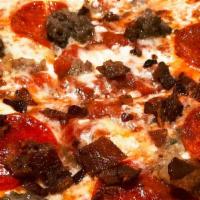 Cacciatore · Pepperoni, ground beef, sausage, bacon, rustic tomato and fresh mozzarella.