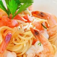 Linguine Con Scampi · Classic shrimp scampi with garlic, white wine, lemon zest, fresh tomato, parsley and olive o...