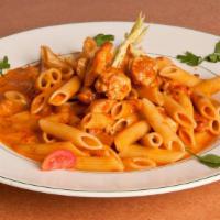 Penne À La Vodka · Penne tossed with a rich pink cream sauce finished with vodka.