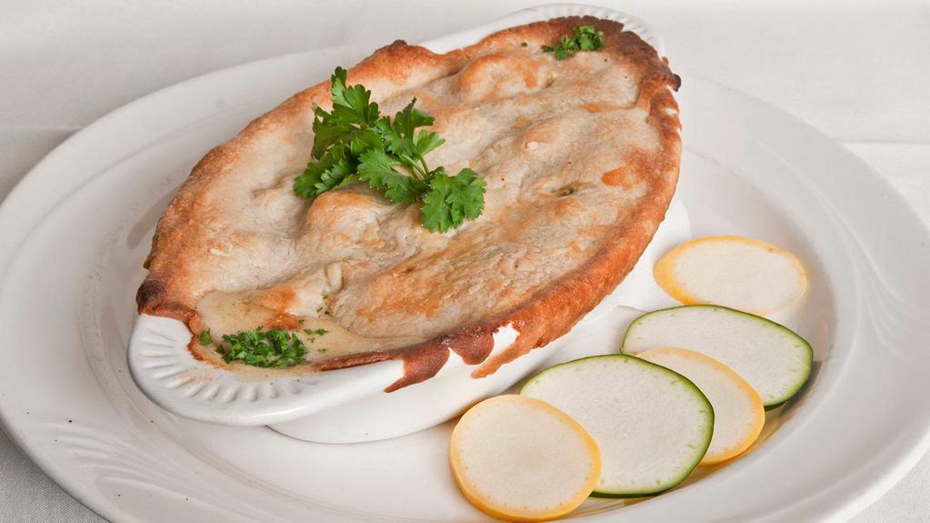 Chicken Pot Pie · Ellery’s take on a comfort food classic. Tasty chunks of chicken and vegetables in a savory pot pie with a golden crust.