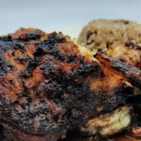 Jerk Chicken & Shrimp · Served with your choice of rasta pasta, rice and peas, mixed vegetables, and mashed potatoes...