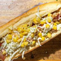 Maicitos Hot Dog · Beef sausage, sweet corn, mozzarella cheese, smoked bacon, potato chips, home made pink, gre...