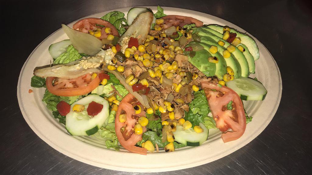Chicken Salad · Comes with lettuce, tomato, cucumber, sauteed onion, mixed veggies, and avocado. Your choice of cilantro or ranch dressing.
