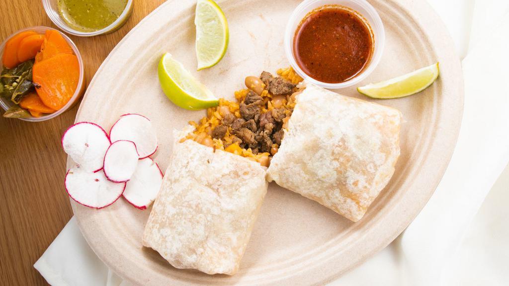 Burrito Grande · 13 in. flour tortilla with your choice of meat. Burrito comes with beans and rice. Add ons available