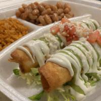 Flautas Plate · Flower tortillas rolled with your choice of meat topped with guacamolio, sour cream, cheese,...