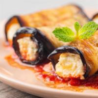 Eggplant Rollatini · Thinly sliced eggplant, fried and rolled up with a ricotta filling.