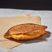 Grilled Cheese · American cheese grilled with potato bun.