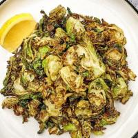 Crispy Brussels Sprouts · Crispy fried brussels sprouts with lemon and salt