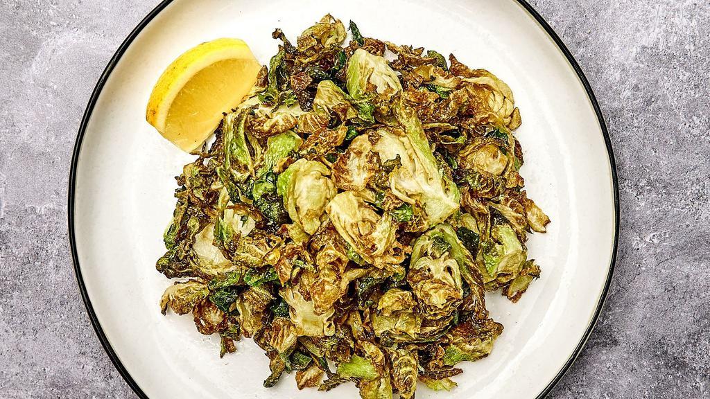 Crispy Brussels Sprouts · Crispy fried brussels sprouts with lemon and salt