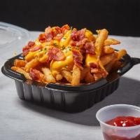 Bacon Cheese Fries · Fresh cut idaho potato topped with a special blend of cheese sauce and crispy Applewood bacon.