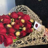 Rose Chocolate · One dozen red roses with chocolate (wrapping could be different color)