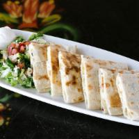 Quesadilla Roja · Our stuffed cheese quesadilla with your choice of ground beef or grilled chicken or beans wi...