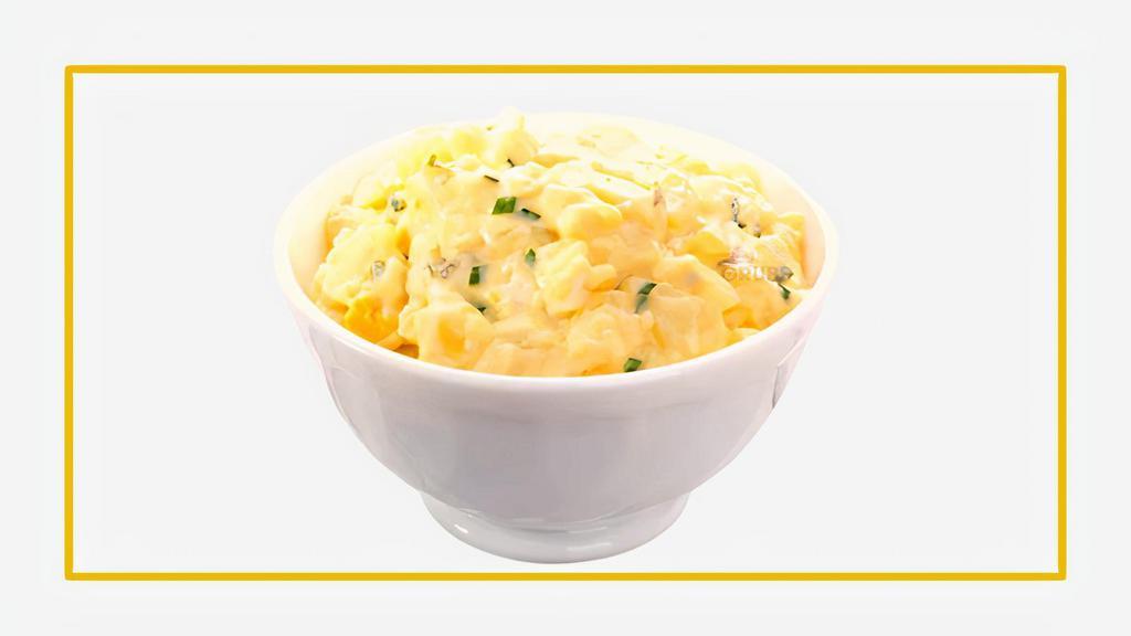 Egg Salad (1/2 Lb) · Our classic egg salad is irresistible! It offers a tasty and familiar flavor that's a worthy addition to your fridge. Featuring fully cooked boiled eggs, and traditional seasonings, this egg salad will leave you feeling full and satisfied whether you use it for an egg salad sandwich or as a hearty side dish.