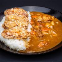  Goma Wing Curry Rice · Served with Hokkaido rice, chicken wings, and red ginger.