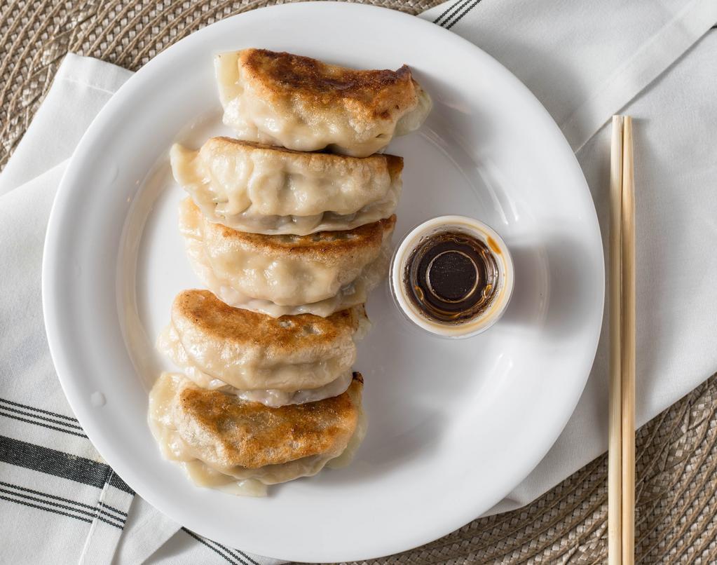  Gyoza · Japanese style pan-fried pot sticker with ground pork and vegetables.