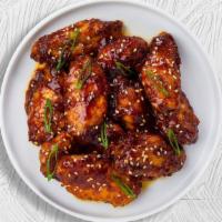 Terrific Teriyaki Wings · Fresh chicken wings breaded, fried until golden brown, and tossed in teriyaki sauce. Served ...