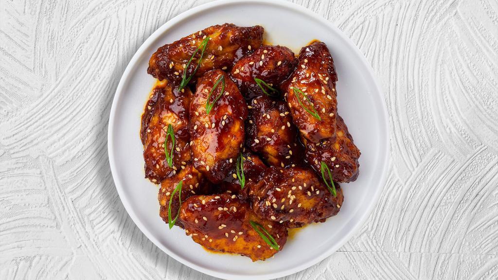 Terrific Teriyaki Wings · Fresh chicken wings breaded, fried until golden brown, and tossed in teriyaki sauce. Served with a side of ranch or bleu cheese.
