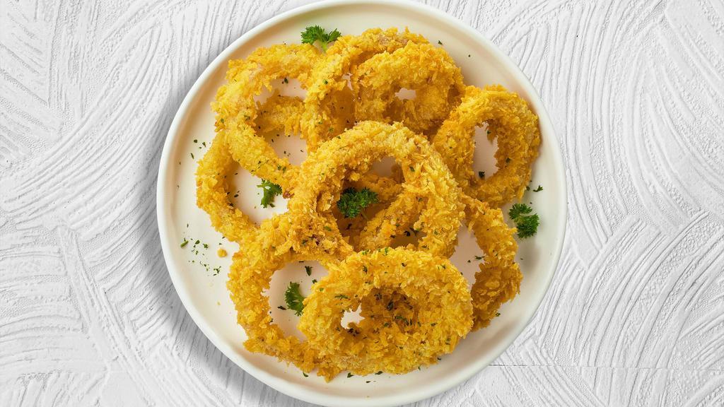 Golden Rings · (Vegetarian) Sliced onions dipped in a light batter and fried until crispy and golden brown.