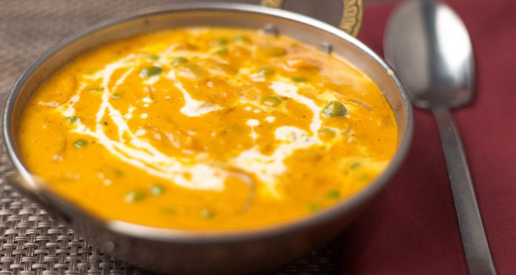 Shahi Mutter Paneer · Fresh green peas with cubes of cheese cooked in a rich mild sauce.