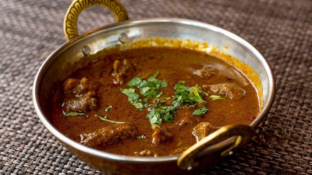 Lamb Curry · Lamb stewed in blend of light spices.
