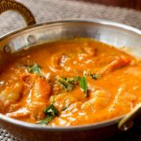 Saffron Shrimp Curry · Jumbo shrimps prepared with authentic homemade exotic spices.