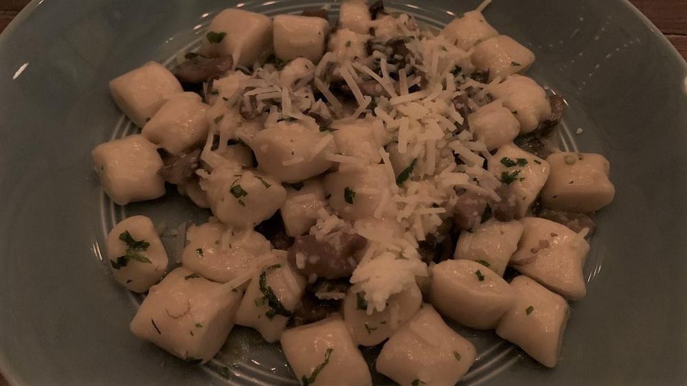 Gnocchi Ai Funghi · homemade potato gnocchi, mixed mushroom, truffle oil, parmigiano-reggiano.