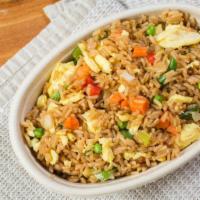 Arroz Chaufa · Chinese and Peruvian fusion: stir fried rice with vegetables and eggs.