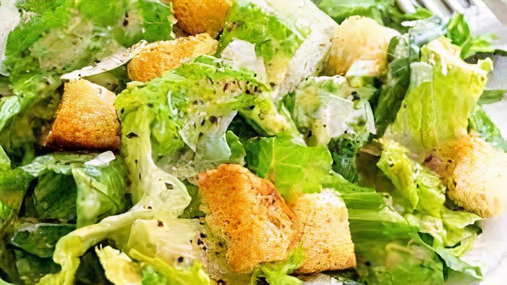 Caesar Salad · Romaine lettuce with caesar dressing, parmesan cheese, and croutons