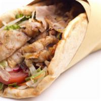 Beef Gyro Sandwich · our famous fine BEEF GYRO on pita, Served with tzatziki sauce, lettuce, onions and tomatoes.