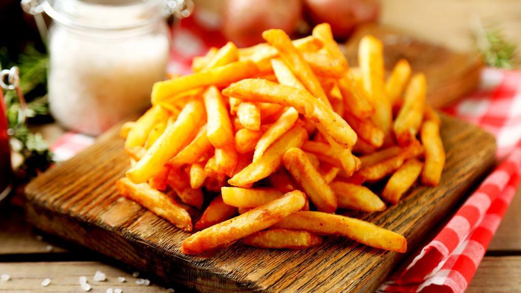 French Fries · Piping hot, thick cut salted fries are golden on the outside and fluffy on the inside.