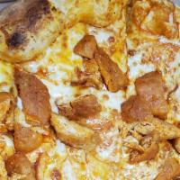 Buffalo Chicken Pizza · 16 inch pizza made with buffalo chicken pices loaded with cheese.
