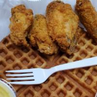 Chicken And Waffle
 · Thick cake made from leavened batter or dough.