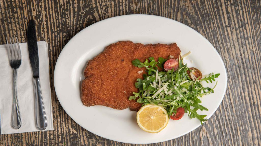 Milanese Di Pollo · Light breaded and fried chicken cutlet.
Side of arugula salad, with cherry tomatoes and parmisan cheese.