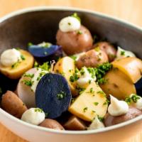 Patatas Bravas · Crispy potatoaes, brava sauce, aioli.