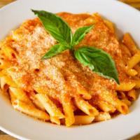 Penne Alla Vodka · Delicious homemade creamy pink sauce with vodka, prosciutto, shallots and penne or substitut...
