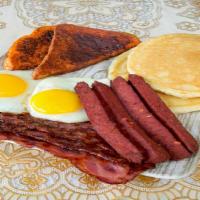 Pancakes With Bacon Or Sausage W/ Eggs And Homefries · With beef bacon or beef sausage.
