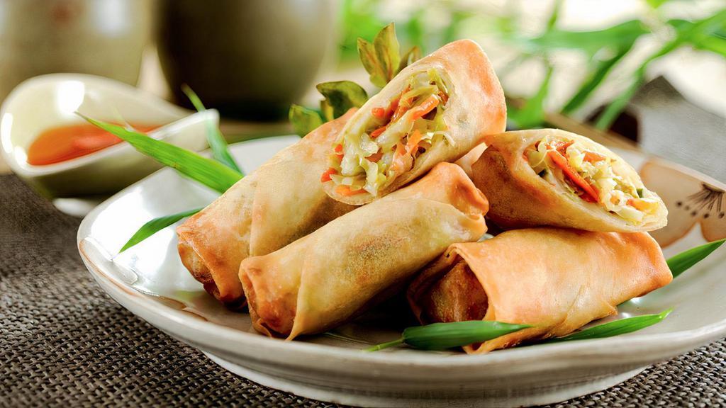 Fried Veg Spring Rolls · 4pcs.Deep fried wheat flour wrapped. Made w. cabbage, carrots, yam bean. vermicelli. Served with lettuce wrap & vinaigrette fish sauce.