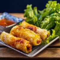 Spring Rolls · Fried rice paper rolls with minced pork, shrimp, mushrooms, taro, carrots, onions and glass ...