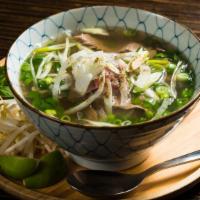 Beef Pho · A clear, fragrant beef broth bearing the aroma of seven spices. Served with top sirloin stea...