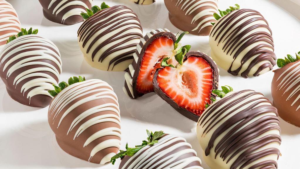 Fresh Gourmet %100 Belgian Chocolate Covered Strawberries · This specially put together box will include chocolate covered strawberries with white and milk chocolate topped with opposite color chocolate drizzled on top to add color to your day!