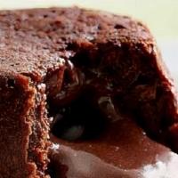 Fresh Fudgy Chocolate Souffle · Light and airy with melting chocolate in the middle, this dessert is a little taste of choco...