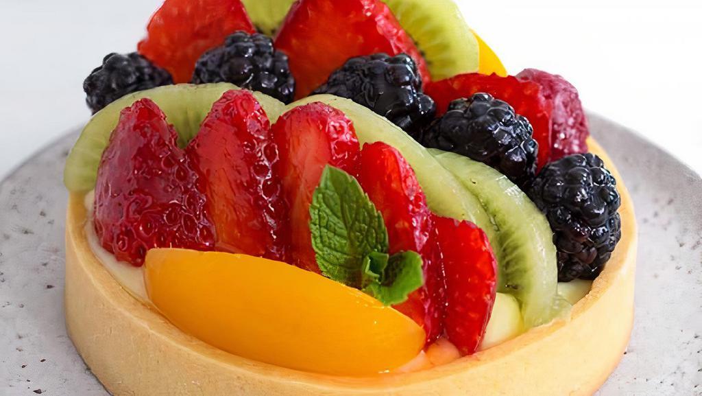 Fresh X-L Organic Fruit Tart · This delicious tart will also win over all those who taste it. Made with our homemade tart filling and organic fruits on top!