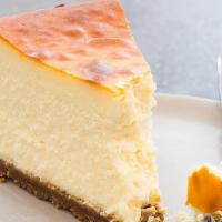 Gourmet Ny Style Cheesecake Slice With Whip Cream · Classics never change!